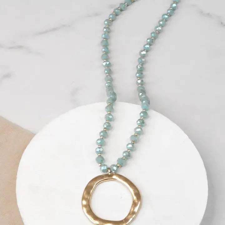 Beaded Necklace with Gold Tone Circle Pendant Aqua