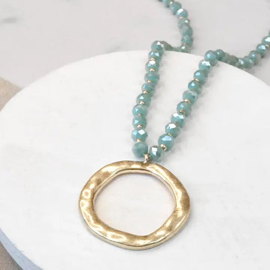 Beaded Necklace with Gold Tone Circle Pendant Aqua